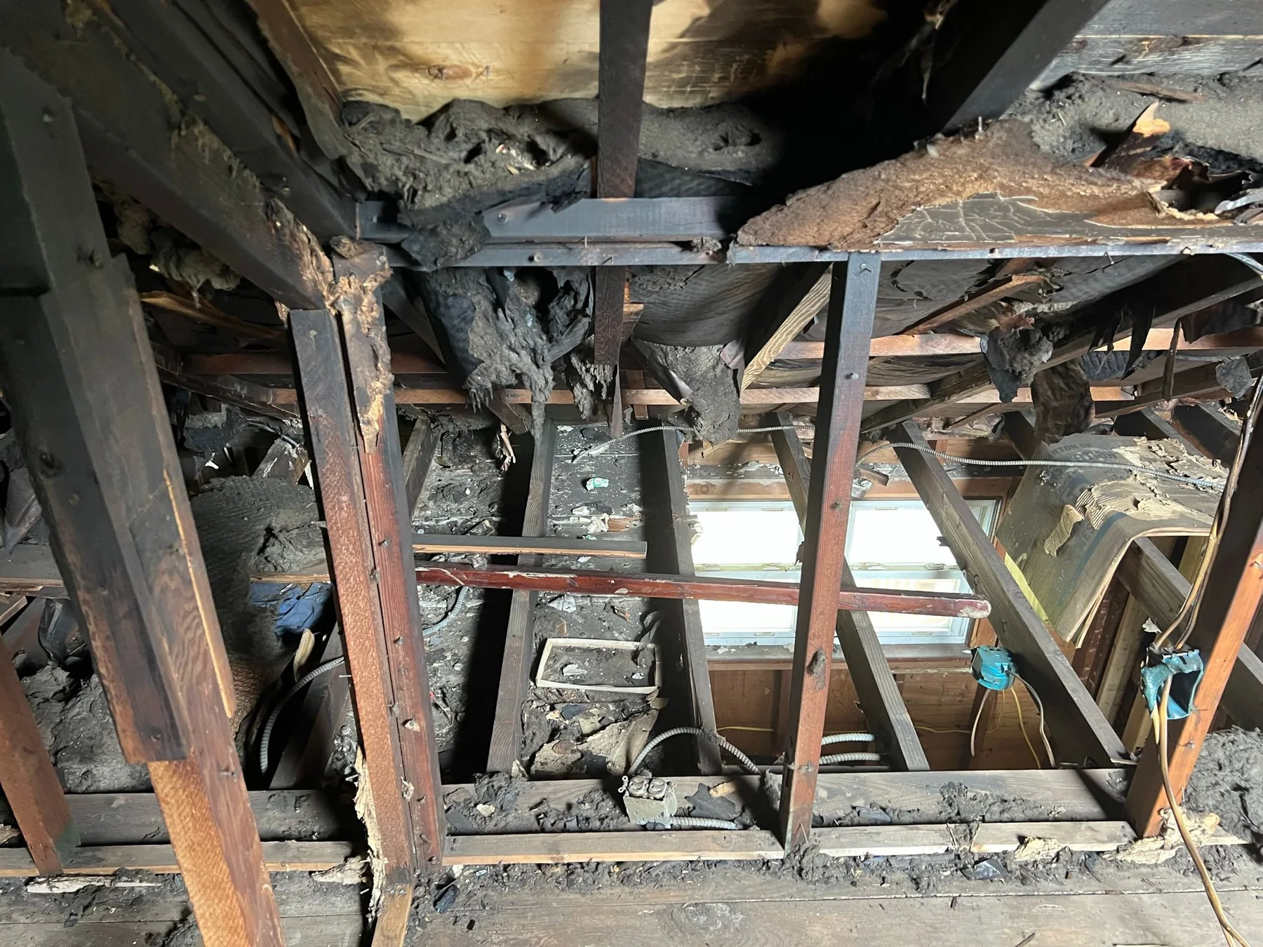 Burned wall and ceiling framing