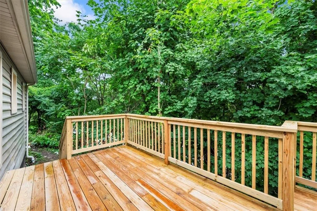 Completed rear deck overlooking trees