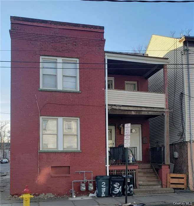 Front elevation and covered porch at 23A City Terrace