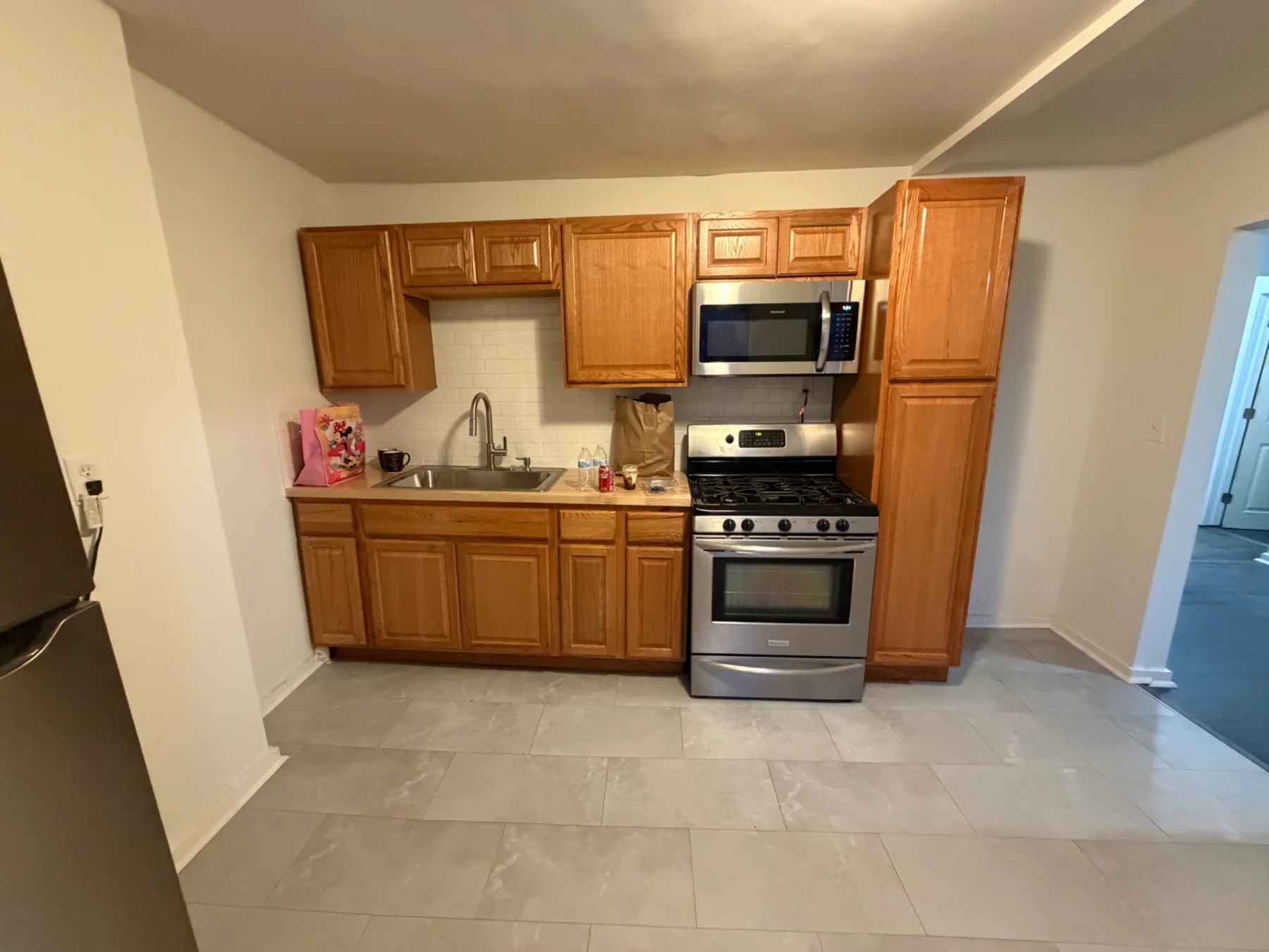 Wide view of the completed second-floor kitchen