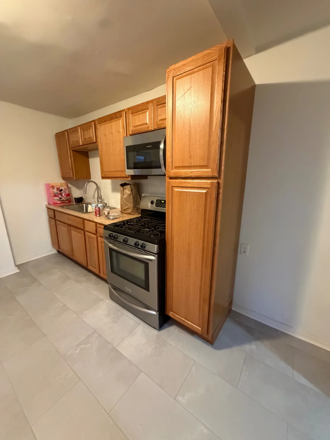 Completed second-floor kitchen cabinetry and appliances