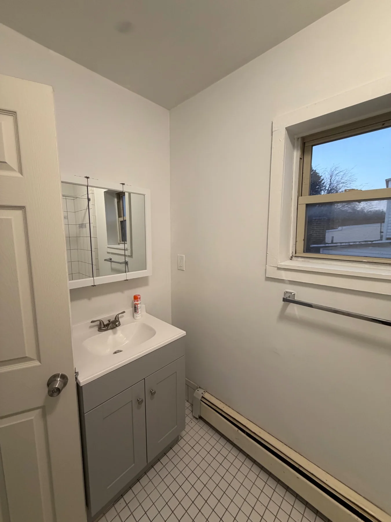 Second-floor bathroom vanity and mirror cabinet