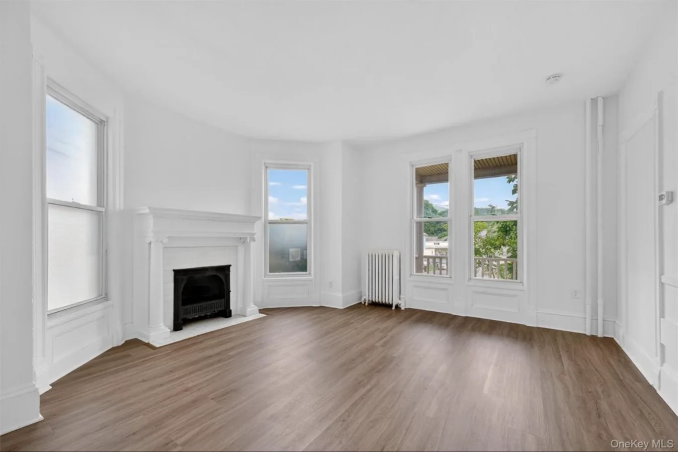 Completed first-floor room with decorative fireplace