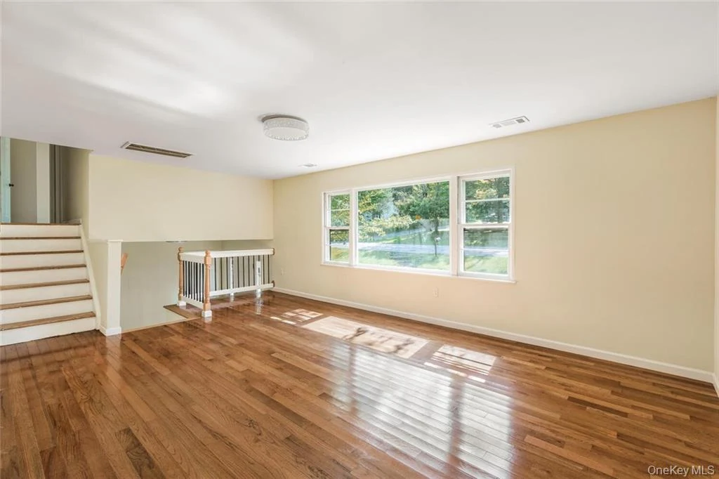 Completed living room with large windows