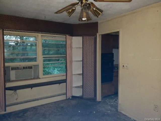 Windowed room before rehabilitation