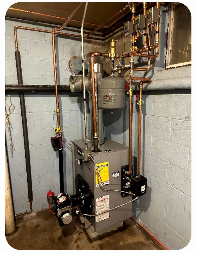 Completed replacement boiler with updated copper piping and controls